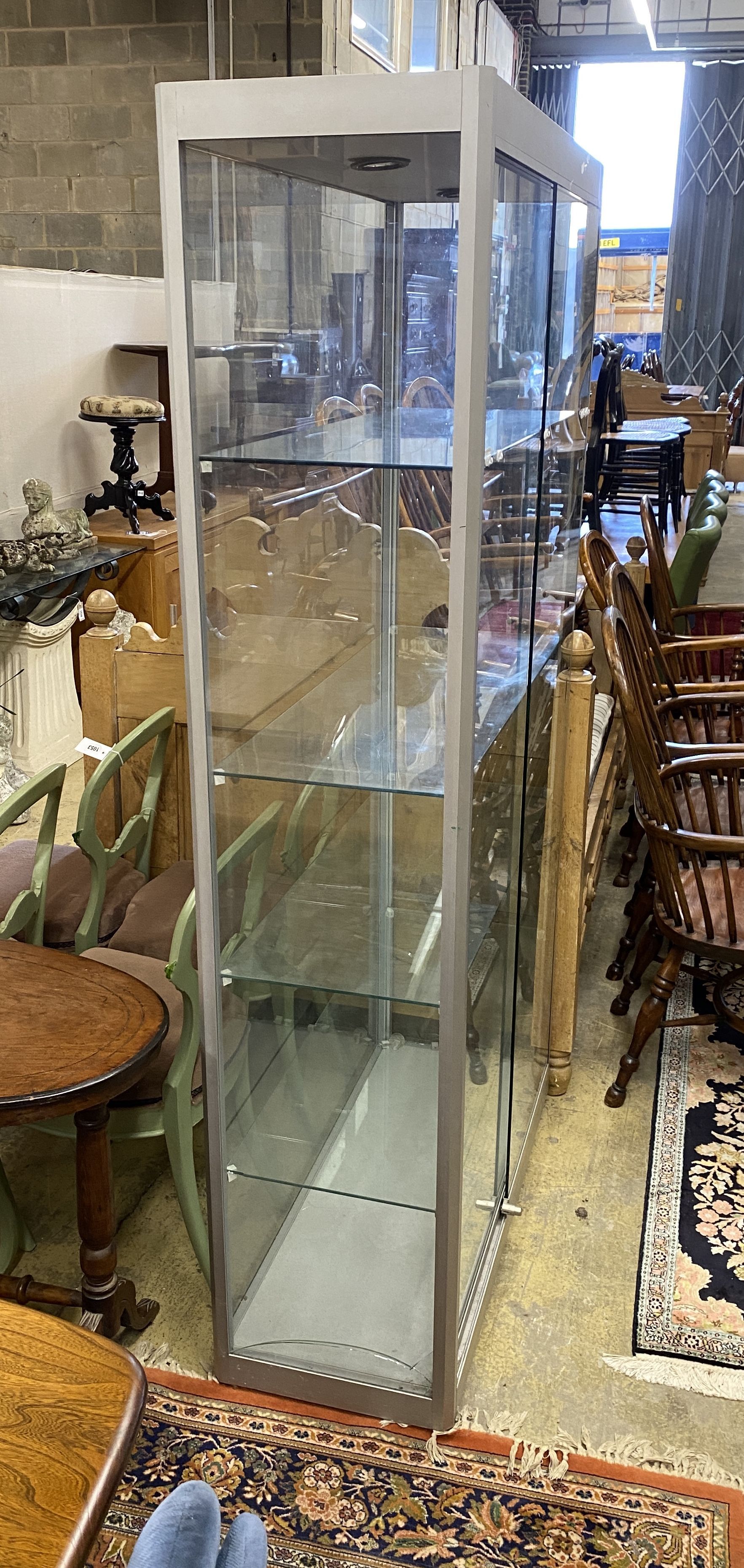A modern glazed shop cabinet a.f., width 100cm, depth 40cm, height 191cm